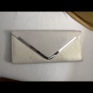 White and gold clutch